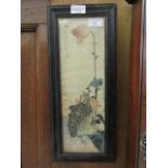 A framed and glazed Japanese pen and watercolour of two birds looking at a flower