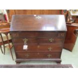 A mid-18th century mahogany bureau,