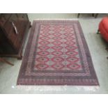 A hand woven Afghan rug,