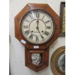 An early 20th century walnut drop dial wall clock signed 'Seikosha' to face