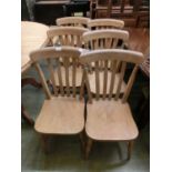 A set of six beech and elm seated kitchen chairs