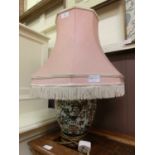 An eastern style ceramic columned table lamp