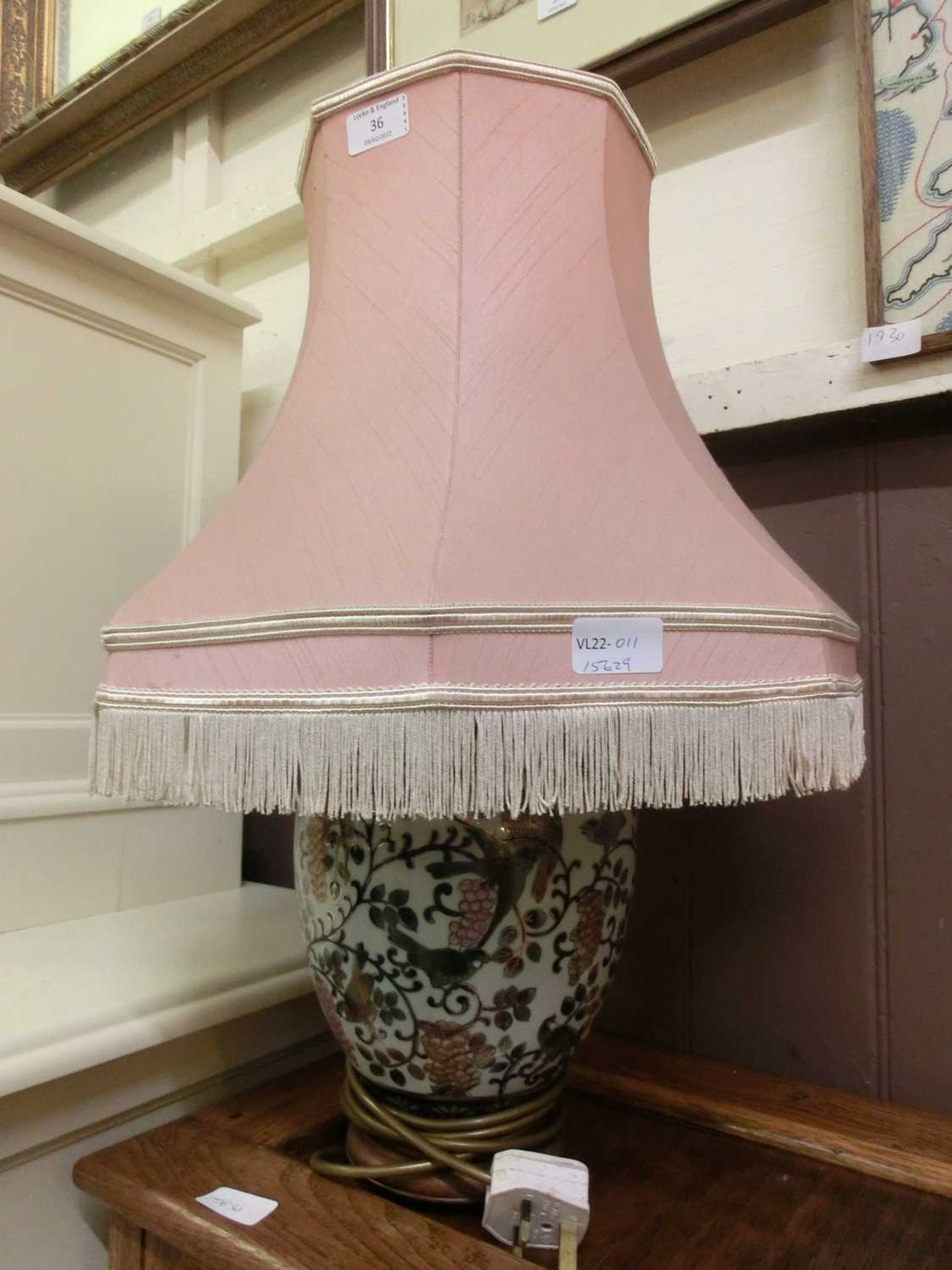 An eastern style ceramic columned table lamp