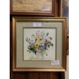 A framed and glazed print of still life after Celia Russel