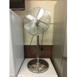 A stainless steel oscillating fan