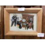 A framed and glazed needlework of musicians