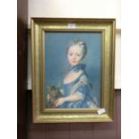 A gilt framed print of girl with cat