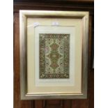 A framed and glazed silk Persian rug samplerCondition report: Silk sampler appears to be modern, has