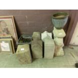 A selection of garden stoneware to include pillars, pots, etc