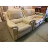 A modern cream leather upholstered two seater settee with matching chair