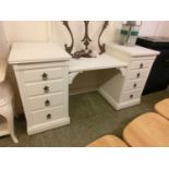 A Victorian mahogany dressing table painted white