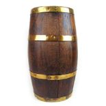 A 19th century oak and brass bound coopered oval barrel, h. 60 cmCondition report: One later oak