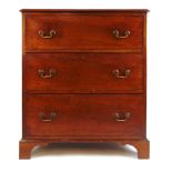 A 19th century mahogany chest of three long drawers with brass carry handles on bracket feet, h.