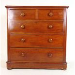 A 19th century mahogany chest of two short over three long drawers on squat bun feet, h. 107 cm,