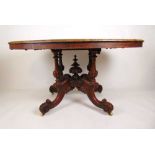 A late Victorian burr walnut, boxwood strung and marquetry breakfast table, the quarter veneered