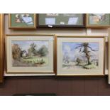 Two framed and glazed watercolours of countryside scenes signed by the artists