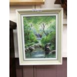 A framed oil on board of waterfall scene signed Hodgins