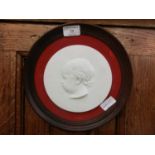 A framed sevres porcelain plaque of child's head