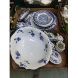 Two trays of blue and white ceramic ware to include bowls, meat plates, side plates, etc