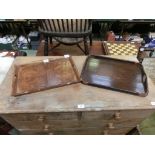 Two wooden twin-handled trays