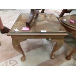 An eastern hardwood brass inlaid occasional table