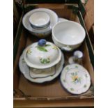 A tray containing a collection of continental style plates, tureens, bowls, etc