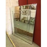 A modern bevel glass rectangular mirror