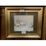 A framed and glazed watercolour of snowy cottage scene signed Cummings