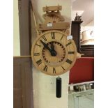 A modern oak wall hanging clock