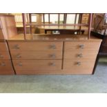 A mid-20th century teak chest of six drawers