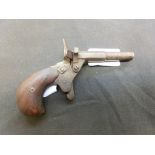 An early 20th century starting pistol