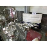 A quantity of silver items to include cream jug, condiment set, fork and spoon, etc, approx silver