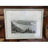 A framed and glazed etching of a river scene