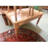 A waxed pine occasional table