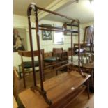 An early 20th century mahogany towel rail