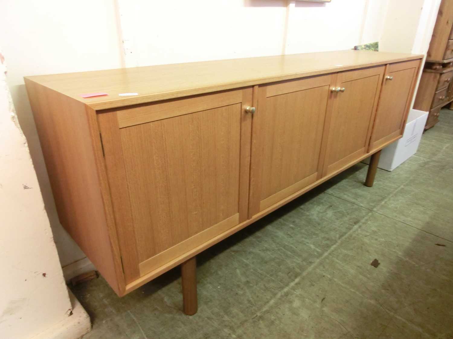 A mid-20th century teak sideboard having four cupboard doorsCondition report: Dimensions: H: - Image 2 of 2