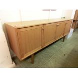 A mid-20th century teak sideboard having four cupboard doorsCondition report: Dimensions: H: