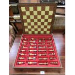 A reproduction chess board with pieces