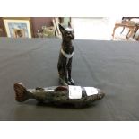 An Egyptian cat and a ceramic trout