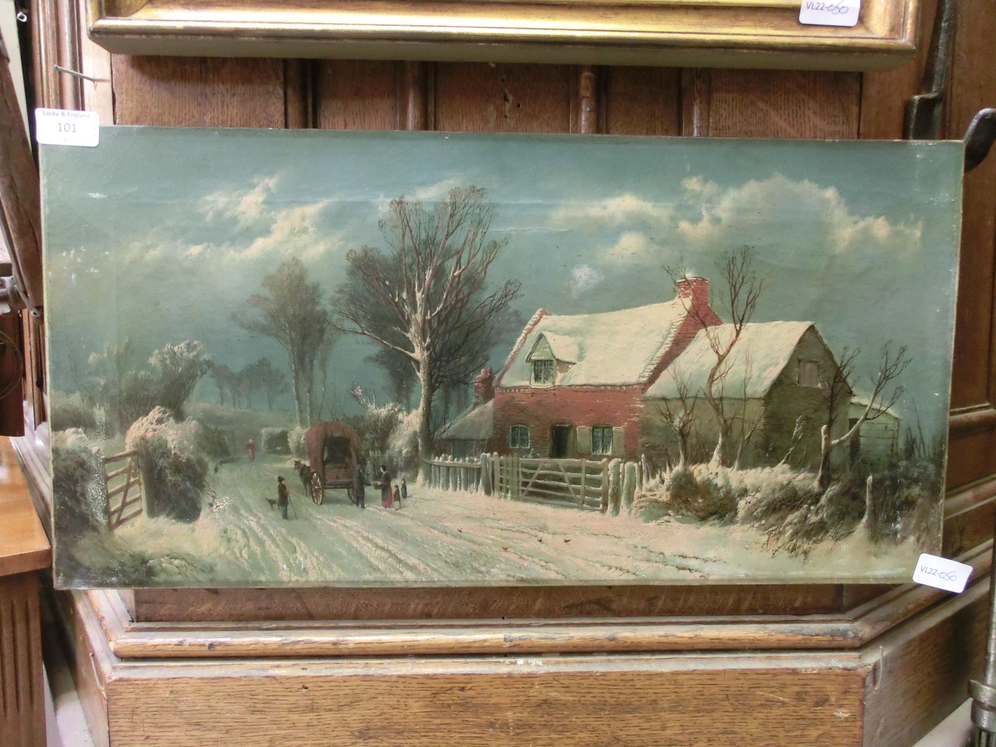 An unframed oil on canvas of snowy lane scene