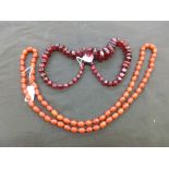 Two red bead necklaces