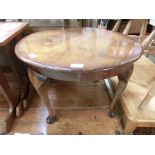 A mid-20th century walnut veneered circular top occasional table on cabriole supports