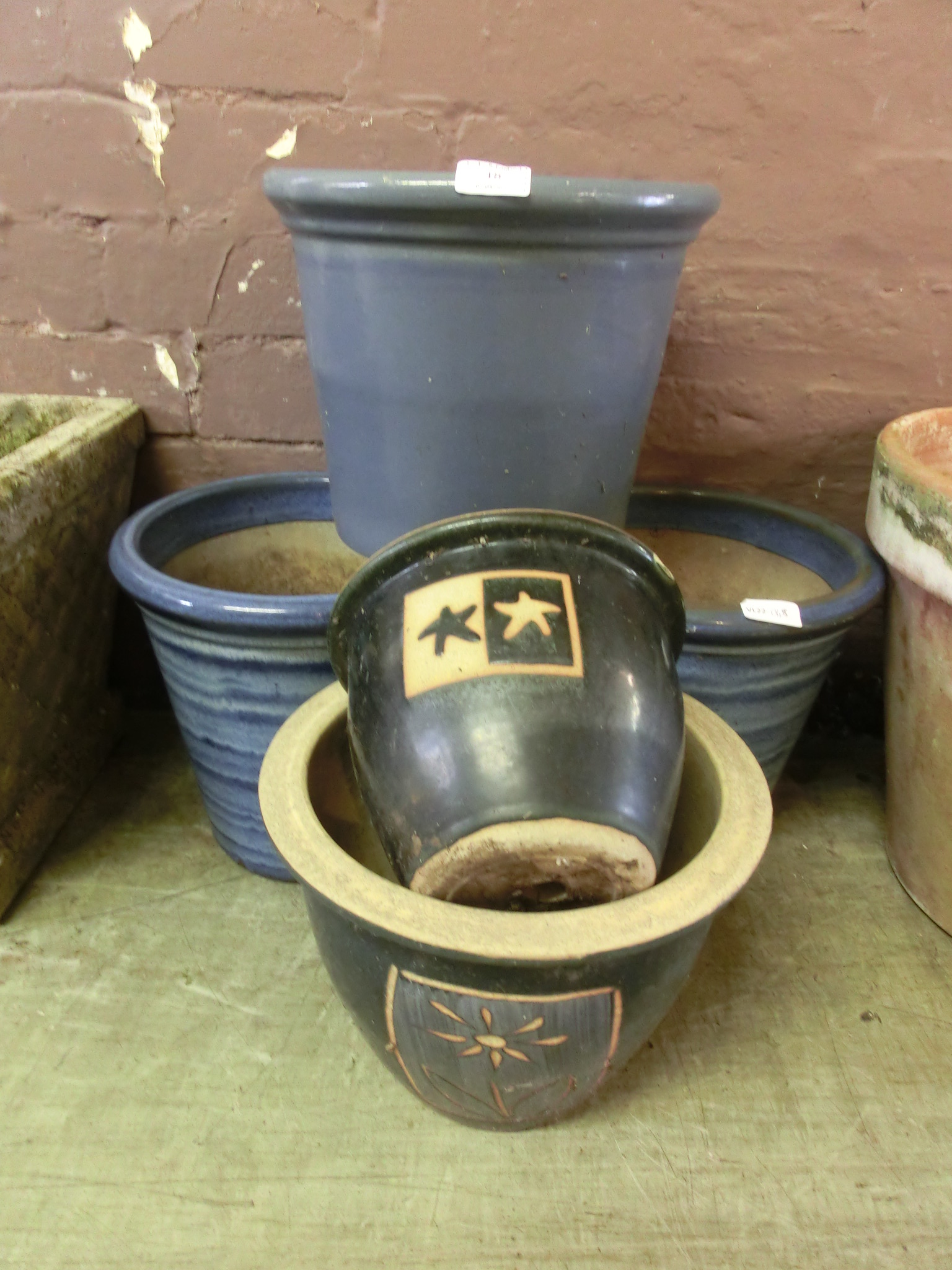 Five assorted blue glazed garden planters