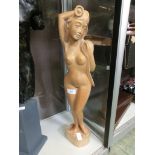 A carved limewood figure of nude lady