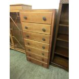 An early 20th century chest of seven drawers