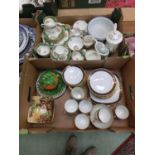 Two trays of decorative ceramic ware to include plates, cups, coffee pot, etc