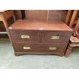 A reproduction three drawer campaign style chest