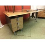 A late 20th century Oroko desk with chromed legs and handles