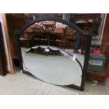 An early 20th century bevel glass oval mirror along with one other