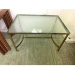 A brass and glass occasional table